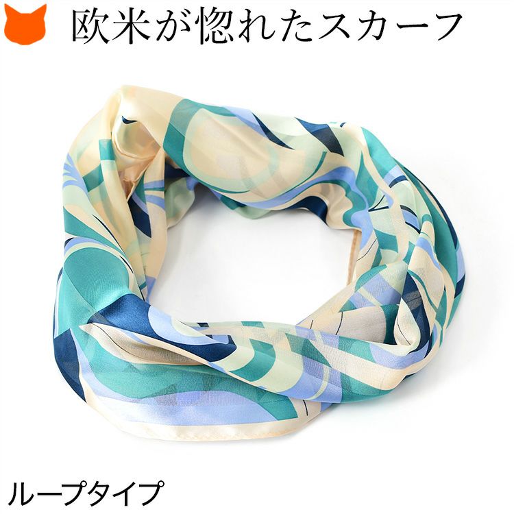 頭からかぶるだけで簡単装着出来るループタイプの横浜スカーフ。エレガントな幾何学柄シルクスカーフ「スウィング」