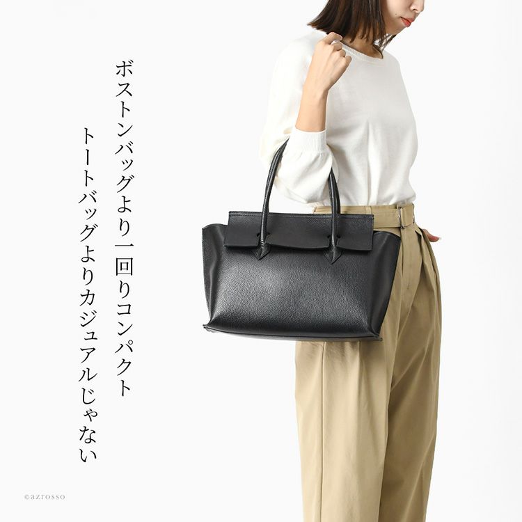 イタリア製フラップトートバッグを持つ女性。A4対応の本革レザートートで、通勤やビジネスに使える自立型の2wayバッグ。ミレッラフィレンツェ（MILLELA FIRENZE）のレディースバッグ
